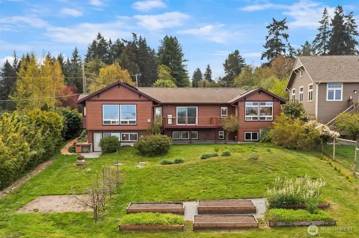 Fruit trees and raised beds for veggies!