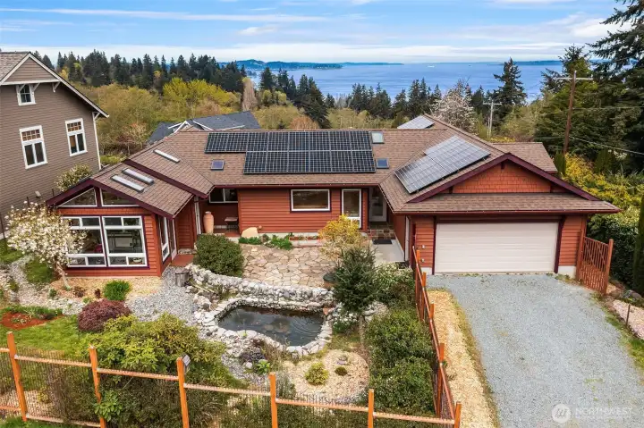 Solar panels and new roof installed in 2021/2022. Two car garage, too!