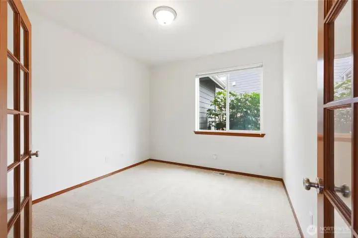 Located on the main floor, this could be a bedroom, home office or den.