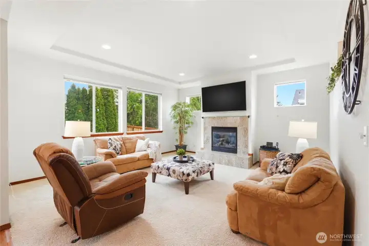 Great room with airy ceiling benefits from southwest exposure for great lighting all day.