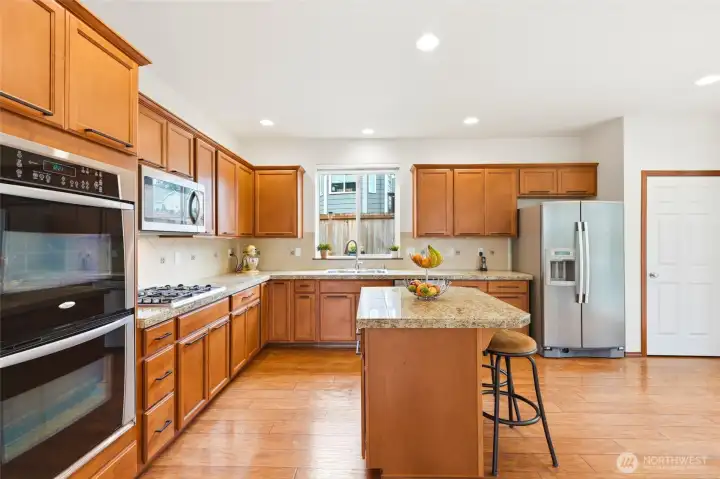 9' ceilings throughout the downstairs and rich hardwood floors.