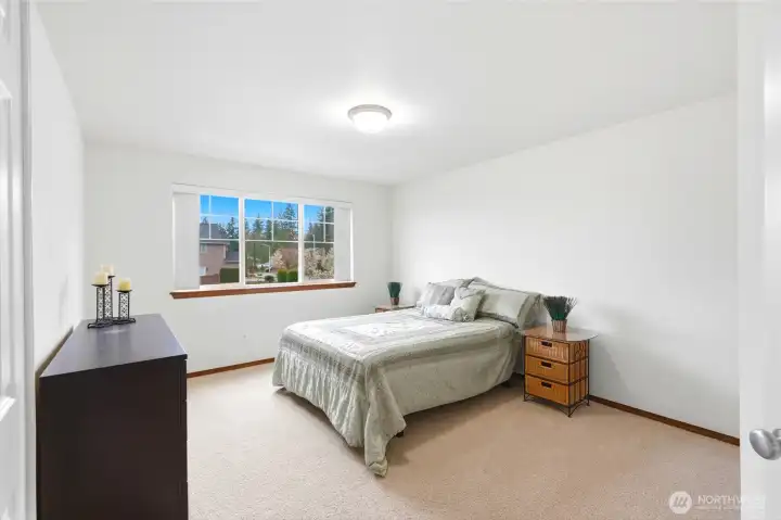Huge bedroom at the top of the stairs.