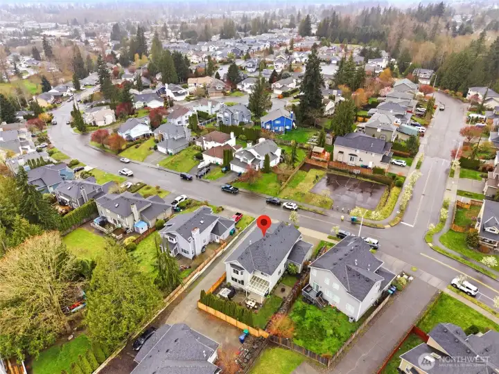 Just across the street is a neighborhood park with large sport court.