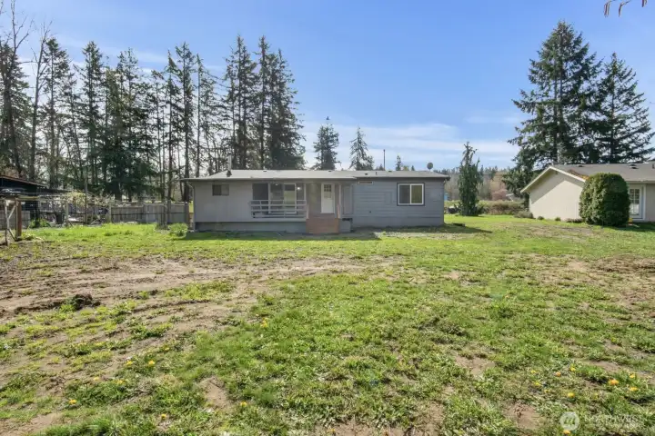 View of the rear of the home from near the creek