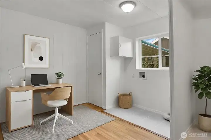 This Utility/Flex room has space and the hook-ups for a full sized washer and dryer. Add a desk or craft table or even a pull out sofa for guests. This room also has a handy 1/2 bath for guests. *Virtually staged