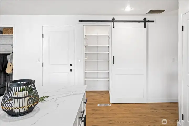 A nice large pantry space with easy access.