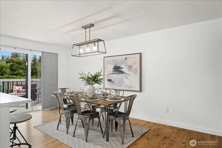 There is an easy flow from the kitchen and dining space out to your private backyard and deck.