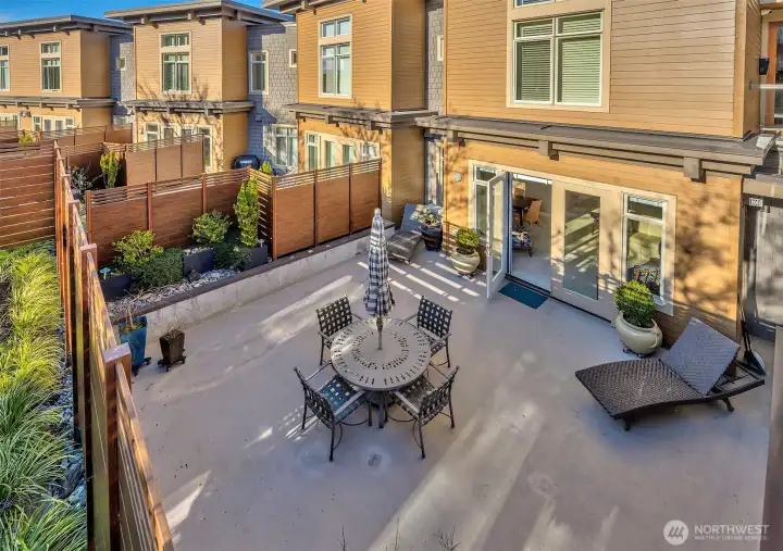 Huge south facing, sun filled patio provides space for gardening, relaxing or dining outdoors on warm evenings.