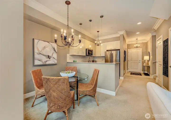 Dining area with custom light fixtures