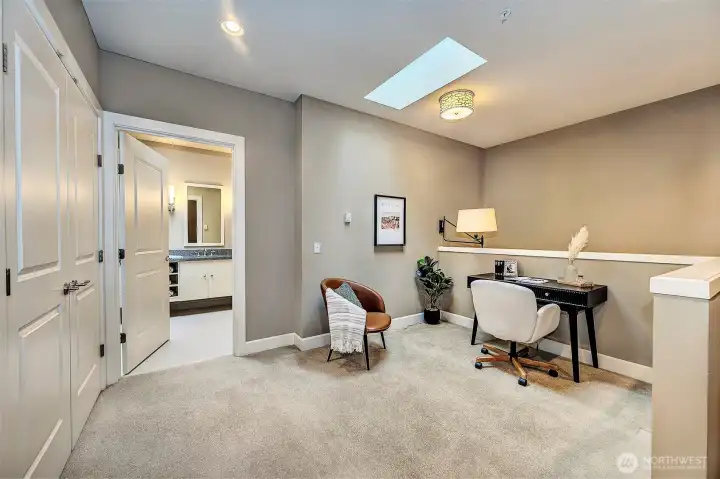 Sky lights create a lovely office or guest room area.