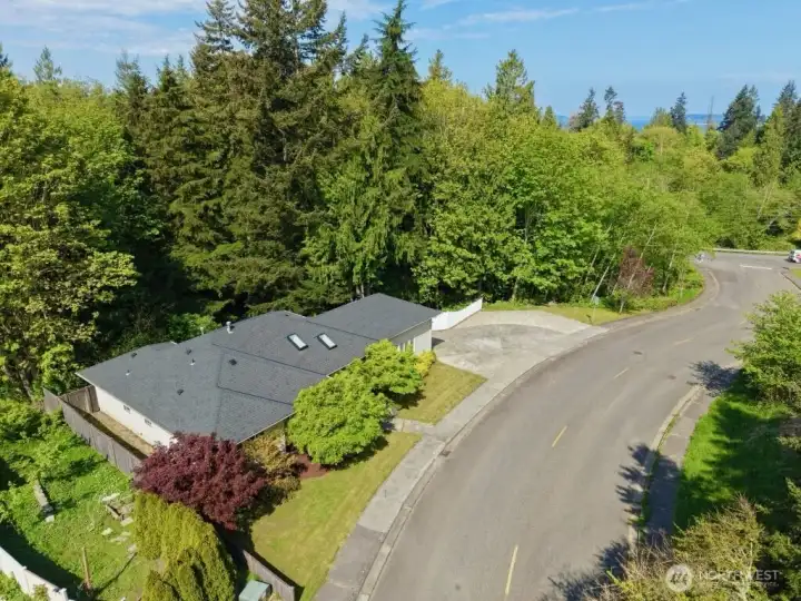conner lot, pacious Trex® deck 240sf overlooking a serene wooded view.