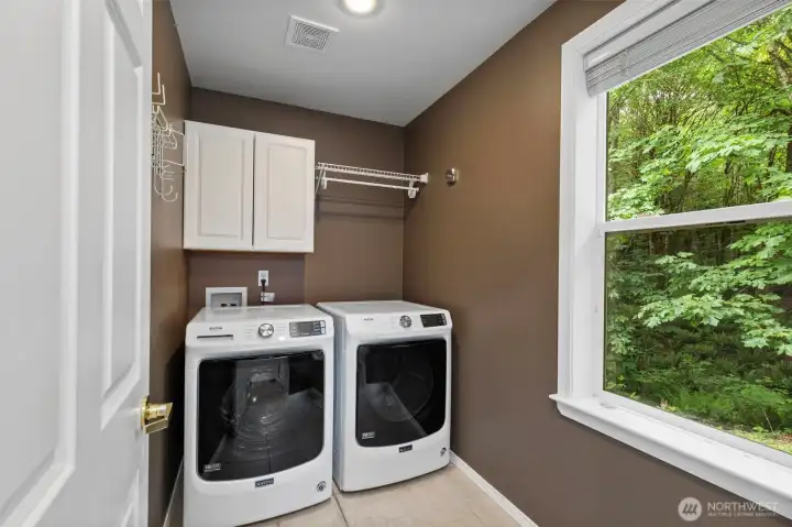 Downstairs utility room off of the garage
