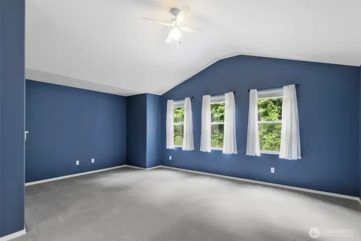 Primary bedroom with built in propane fireplace