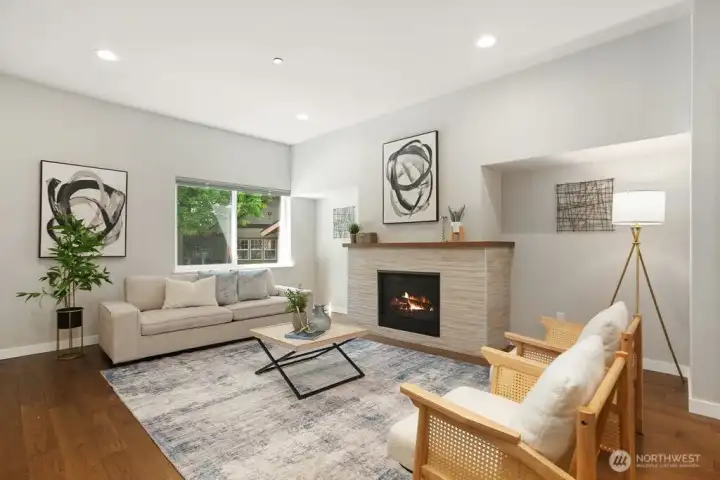 Another view of the family with the modern fireplace!