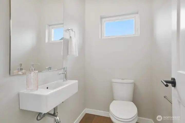 Main floor modern powder room.