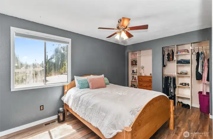 Primary bedroom with access to the main bathroom