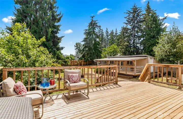 sit back her and enjoy your new deck, privacy and this incredible large lot