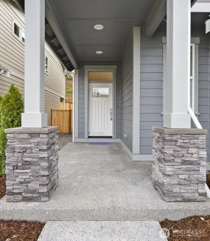 Covered front porch creates a welcoming entry. Covered front porch creates a welcoming entry.