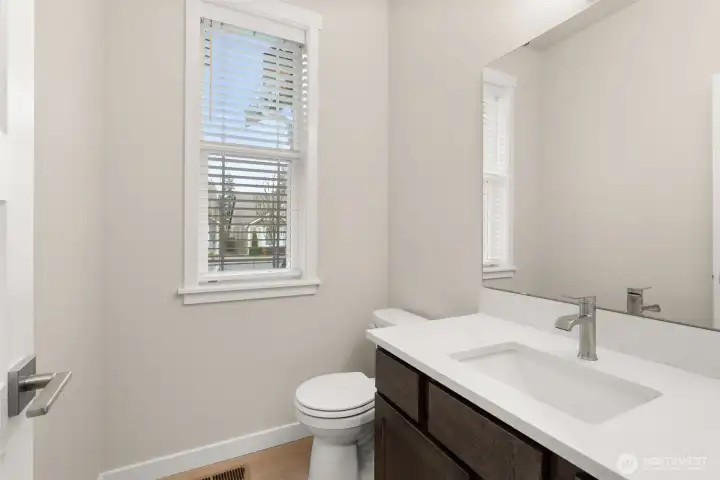 Conveniently located guest bath on main floor Conveniently located guest bath on main floor