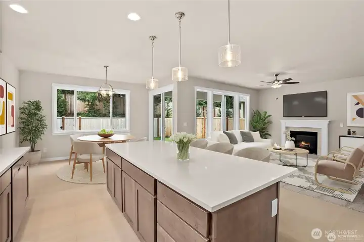 Virtually staged kitchen, dining and great room Virtually staged kitchen, dining and great room