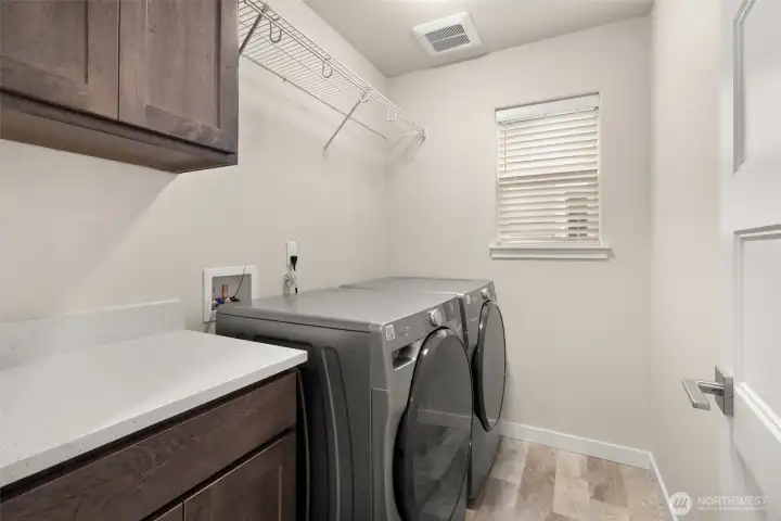 Laundry room with storage and shelving Laundry room with storage and shelving