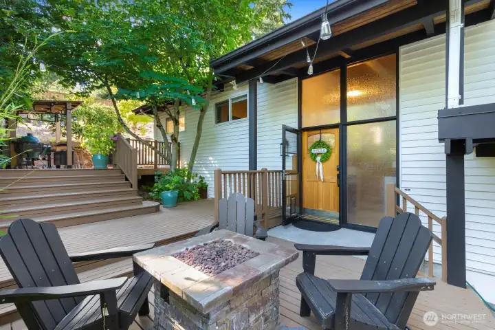 Warm greetings for you and your guests at the main front door. The deckscape begins here and wraps around into the backyard for a seamless flow. Warm greetings for you and your guests at the main front door. The deckscape begins here and wraps around into the backyard for a seamless flow.