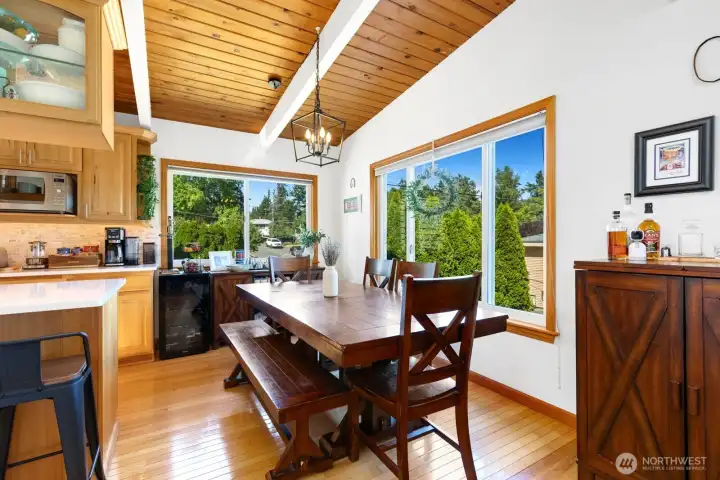 This flexible dining space can accommodate an even longer table for a crowd, or works well with a small round one depending on your style. This flexible dining space can accommodate an even longer table for a crowd, or works well with a small round one depending on your style.
