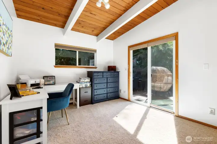 A flexible room on the main floor, with sliding doors that open to the back deckscape. A den, home office, or guest bedroom? A flexible room on the main floor, with sliding doors that open to the back deckscape. A den, home office, or guest bedroom?