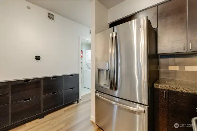 Special hallway storage is perfect for shoes, mail.