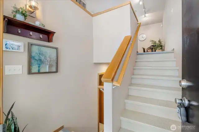Split entry w/ durable flooring on stairs