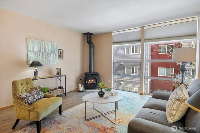 Floor to ceiling windows and gas fireplace