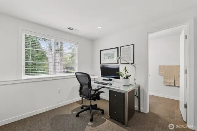 En suite office with closet and bath