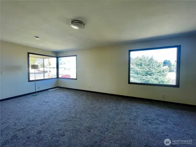 Living room with corner windows.