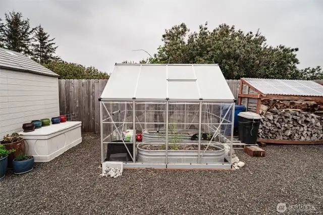 A greenhouse for flowers, veggies, herbs, etc.