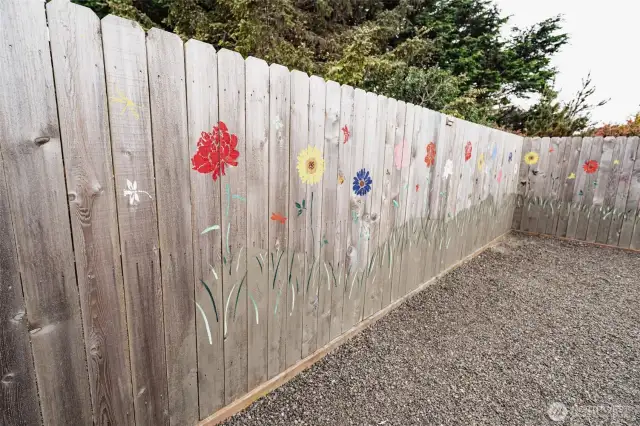 What a fun fence with a pop of color.