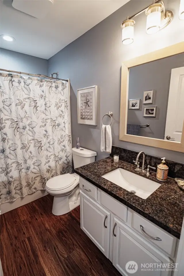 Main bathroom with tub.