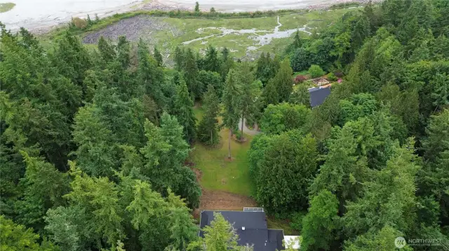 Property is 2 .236 acres and adjoins Nature Conservancy Lands on two sidesa