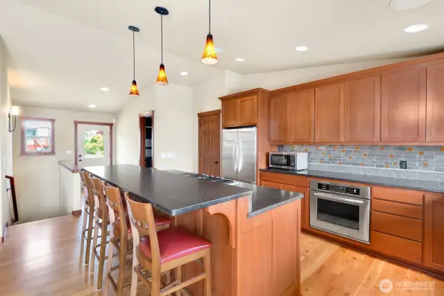 Custom kitchen with lots of seating at counter top