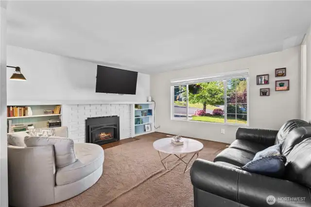 Relax in front of the fireplace in the living room