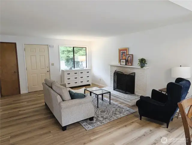 Living room with cozy fireplace. #2407 Elliott Ave NW, Olympia, WA 98502
