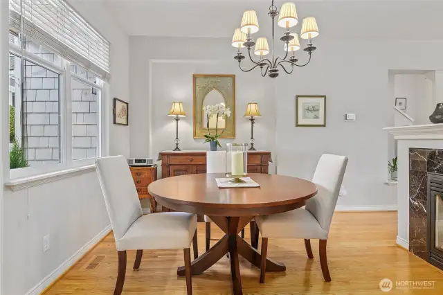 Dining room, buffet, fireplace, hardwood floors