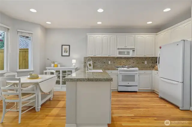Kitchen, informal dining with view/entry to patio area.
