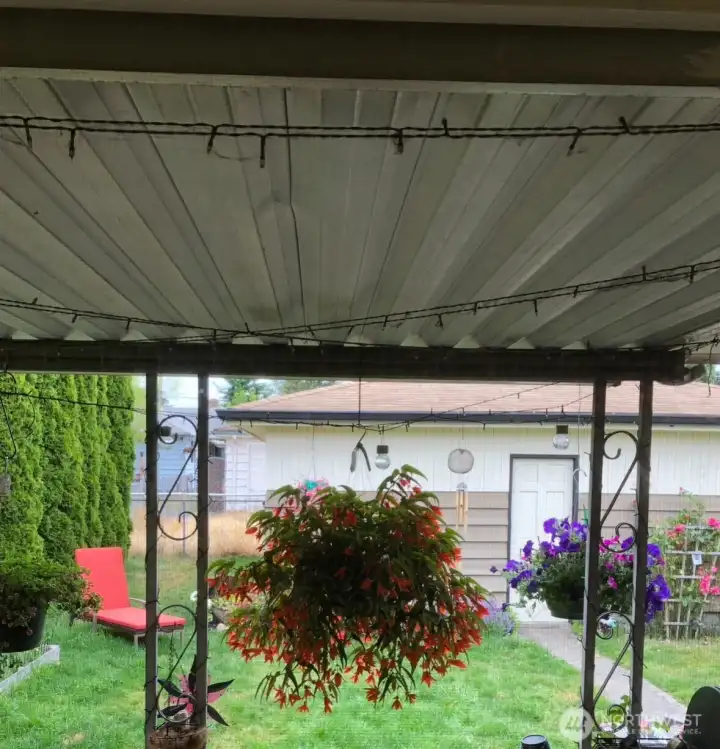 Nice covered patio! You can BBQ all winter long!
