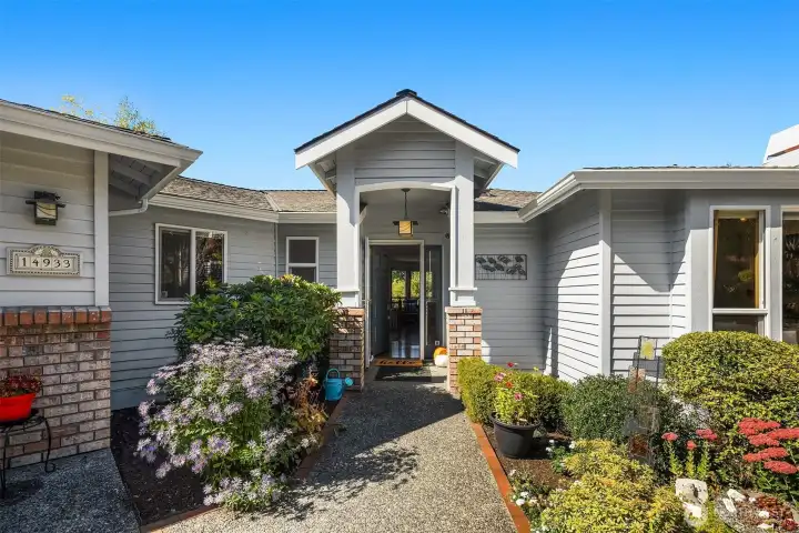 This daylight rambler with a main floor primary suite is truly a one of a kind opportunity on Finn Hill