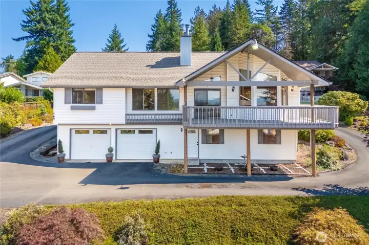 With a view of the mountains and the west facing sunsets, this deck with Trex decking welcomes you.