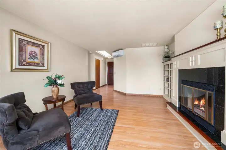 Wood burning fireplace and a duct-less mini split for air conditioning.