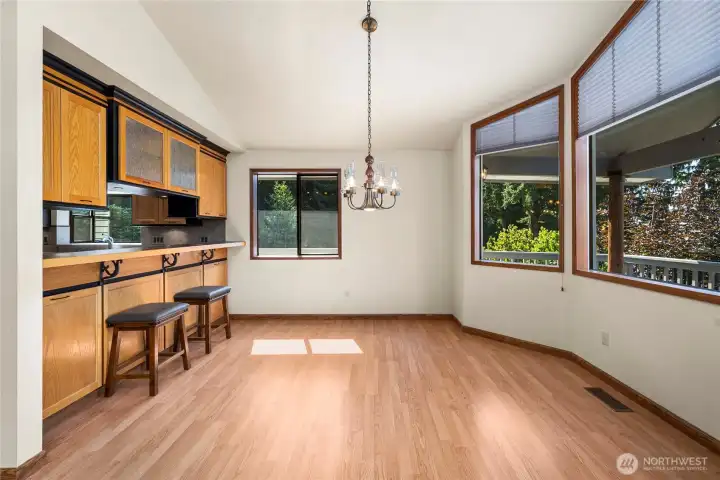Kitchen eating bar and dining room.