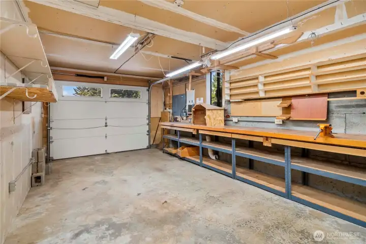 The garage is separated into 2 bays. This one contains the shop area.