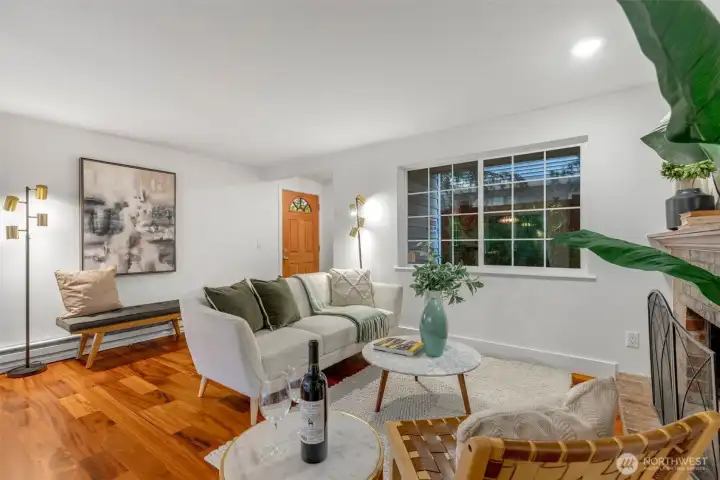 Cozy living room and front entry + coat closet/bench
