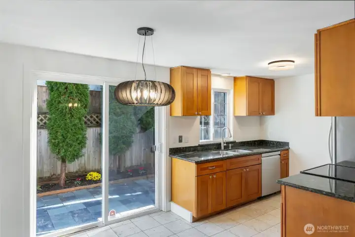 Eat-in kitchen area with access to spacious back patio
